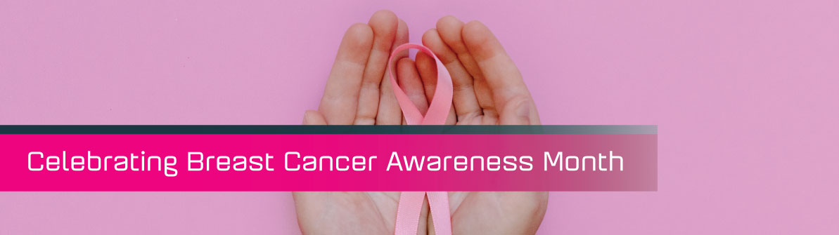 Two hands holding the pink cancer ribbon.