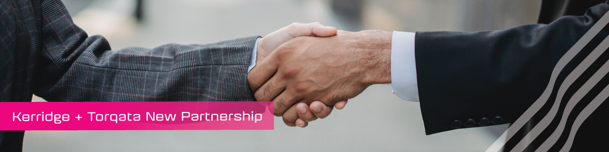 A handshake between two men with a strap that reads Kerridge + Torqata new partnership.