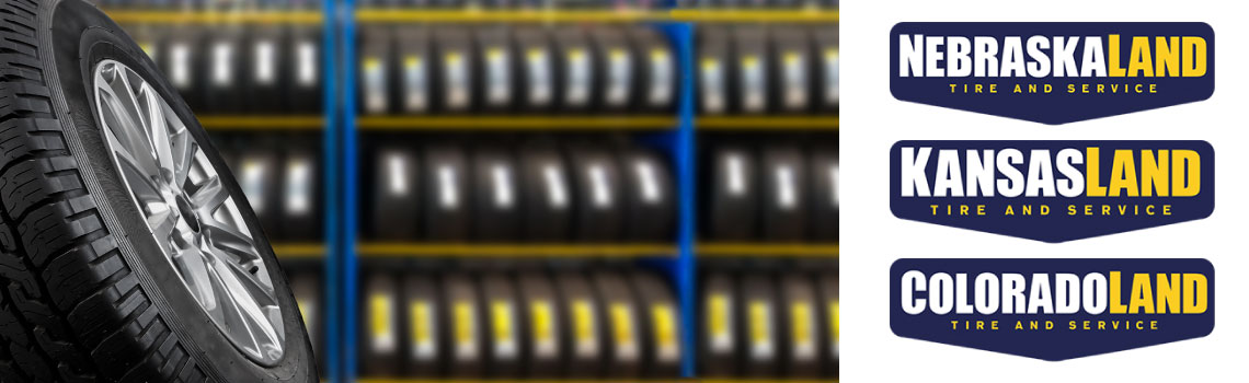 A car tire with the NKC Tire Group logo on