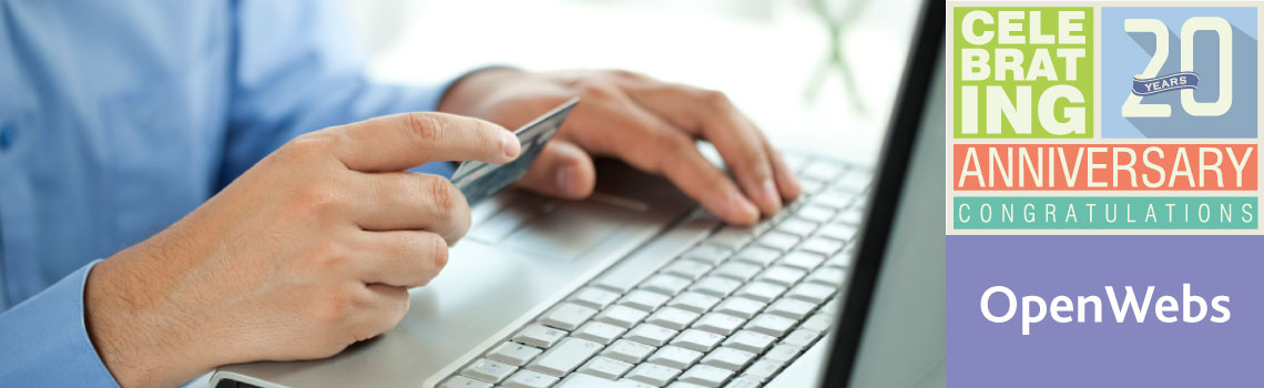 A person holding a credit card and working on a laptop with the OpenWebs logo.